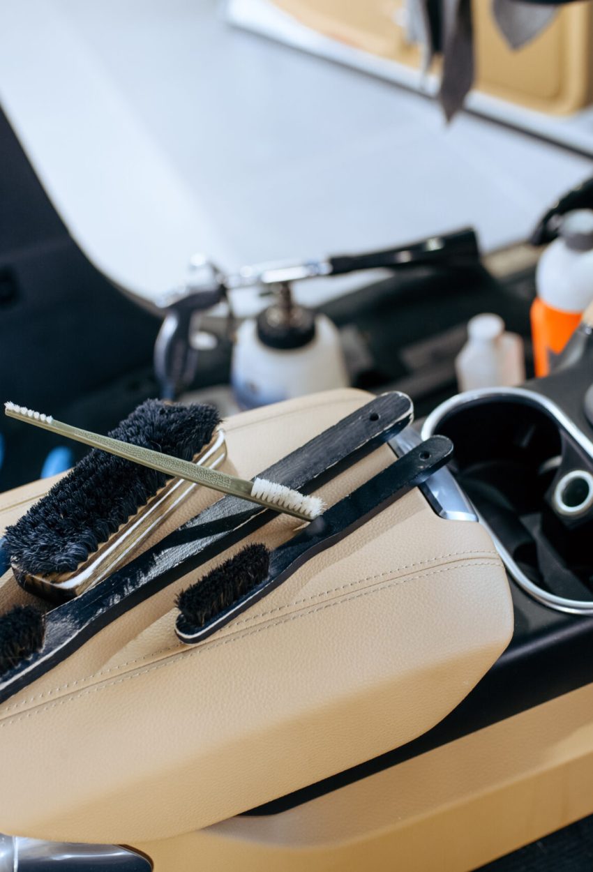Car interior and brushes for detailing, nobody Car interior and brushes for dry cleaning and detailing, nobody. Vehicle washing, thoroughly care of automobile, chemical and vacuum clean service
